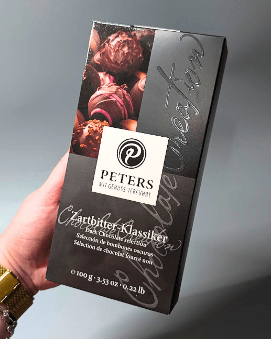 PETERS – Kolekce pralinek z hořké čokolády 100 g S ALKOHOLEM