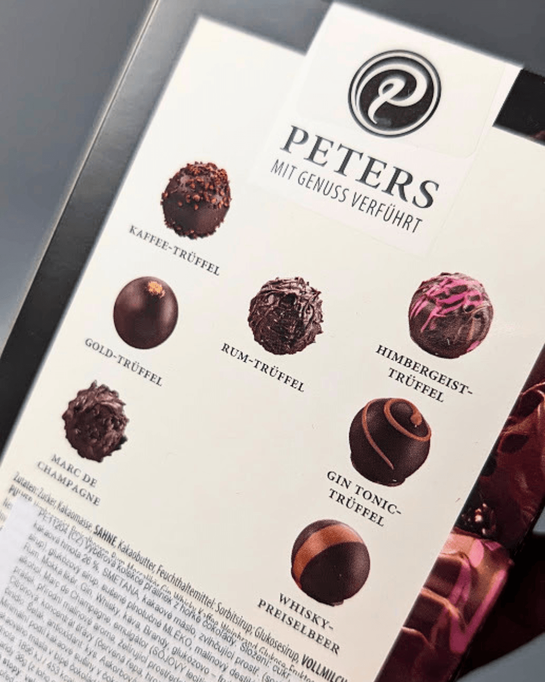 PETERS – Kolekce pralinek z hořké čokolády 100 g S ALKOHOLEM